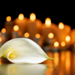 Une fleur de lys entourée de bougies allumées